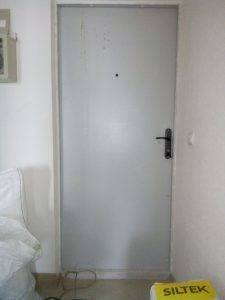 Дверь после ремонта
